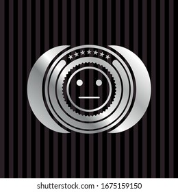 serious face icon inside silvery shiny emblem