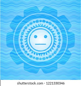 serious face icon inside water representation emblem.