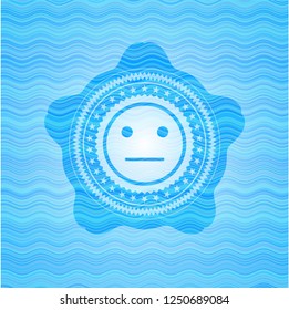 serious face icon inside water wavec oncept emblem.