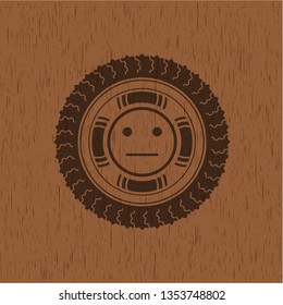 serious face icon inside wood emblem. Retro