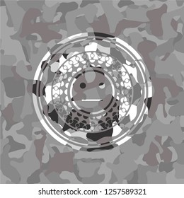 serious face icon on grey camouflage pattern