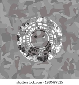 serious face icon on grey camo texture