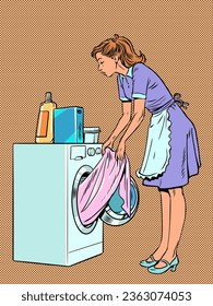 The servants help the owners with the laundry. Responsible housewife takes care of household chores. A girl in uniform pulls clothes out of the washing machine.