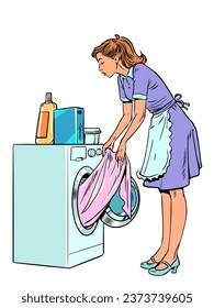The servants help the owners with the laundry. Responsible housewife takes care of household chores. A girl in uniform pulls clothes out of the washing machine.