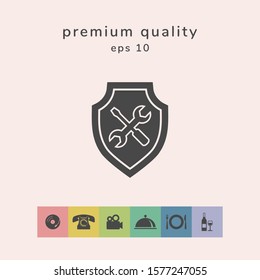 Service icon - shield with screwdriver and wrench. Graphic elements for your design