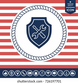 Service icon - shield with screwdriver and wrench