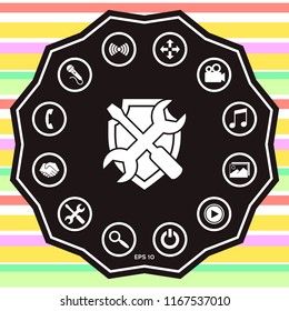 Service symbol icon - shield with screwdriver and wrench