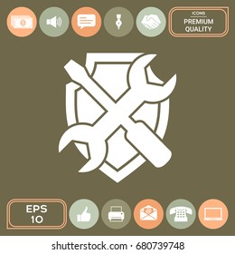 Service symbol icon - shield with screwdriver and wrench