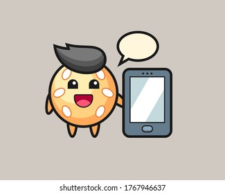 Sesame ball cartoon holding a smartphone