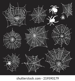 Set of 10 different spiderwebs and spiders on black background