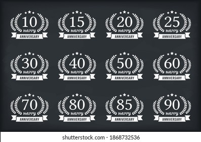 Set of 12 anniversary emblems with laurel wreaths and ribbons, 10 - 90 years, vector eps10 illustration