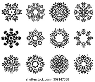Set of 12 Circle Ornaments in Shape of Snowflakes.