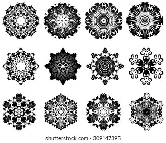 Set of 12 Circle Ornaments in Shape of Snowflakes.