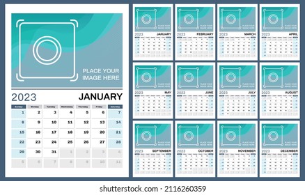 Set of 12 vertical calendar pages for 2023 in blue and gray shades with place for photo. Vector design template. Week starts on Sunday.