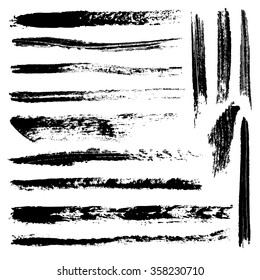 Set of 14 artistic mascara brush strokes. Qualitative trace of real mascara texture. Different black lines isolated on a white background.