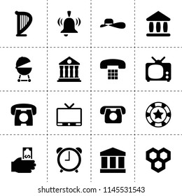 Set of 16 classic filled icons such as honeycombs, hand holding money, tv, bank, desk phone, theater, harp, casino chip, barbecue, woman hat, government, alarm clock