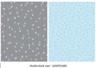 Set of 2 Abstract Hand Drawn Childish Style Seamless Vector Patterns. White and Blue Arches Isolated on a Gray Background. White and Gray Arches on a Light Blue Background. Funny Geometric Print.