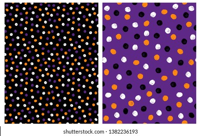 Set of 2 Abstract Seamless Vector Patterns with Hand Drawn Irrgegular Dots on a Black and Violet Background. Black, Orange, White and Violet Geometrick Doted Design. Funny Repeatable Party Layouts. 