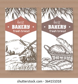 Set of 2 bakery label templates with windmill, wheat and bread on white background placed on cardboard texture. Great for bakery and bread shop ads, brochures, labels.