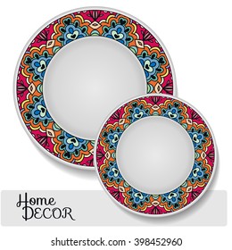 Set of 2 matching decorative plates for interior design. Tribal ethnic ornament, home decor vector illustration.