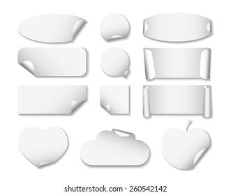 Set 2 of white paper stickers on white background with shadows. Round, square, rectangular, ellipse, heart, cloud, apple
