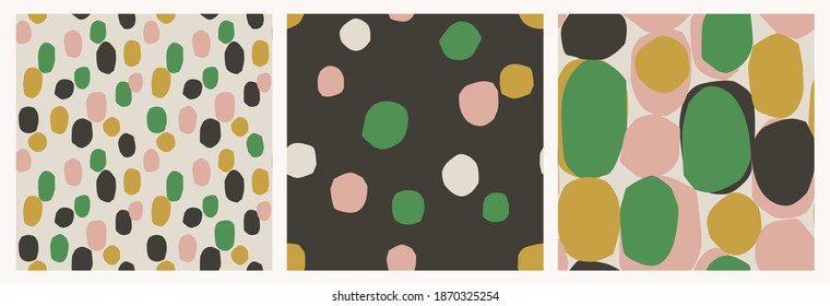 Set of 3 abstract dot seamless patterns with cut out shapes of blobs, ovals, spots. Trendy geometric shapes. Bold prints for fashion, paper, gifts.