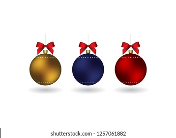 Set of 3 Christmass balls with ribbon hanging on a golden chain