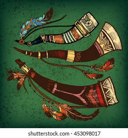 Set of 3 colored hunting horns. Bright card card with hunting horns and colored feathers and beads on green background.