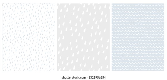 Set von 3 süßen abstrakten geometrischen Vektormustern. Weiß, Grau und Blau Farbdesign. Gebürstete Regentropfen auf Weiß und Hellgrau. Unregelmäßige weiße Wellen auf hellblauem Hintergrund. 