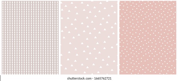 Set of 3 Geometric Seamless Vector Pattern with White Triangles and Grid Isolated on a Light Blush Pink Background. Simple Lovely Confetti Rain of Trangle Shape. Cute Checkered Vector Print.