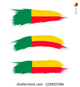 Set of 3 grunge textured flag of Benin, three versions of national country flag in brush strokes painted style. Vector flags.