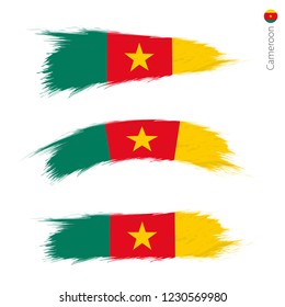 Set of 3 grunge textured flag of Cameroon, three versions of national country flag in brush strokes painted style. Vector flags.