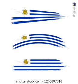 Set of 3 grunge textured flag of Uruguay, three versions of national country flag in brush strokes painted style. Vector flags.