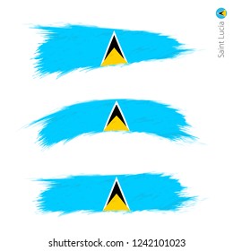 Set of 3 grunge textured flag of Saint Lucia, three versions of national country flag in brush strokes painted style. Vector flags.