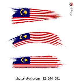 Set of 3 grunge textured flag of Malaysia, three versions of national country flag in brush strokes painted style. Vector flags.