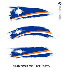 Set of 3 grunge textured flag of Marshall Islands, three versions of national country flag in brush strokes painted style. Vector flags.