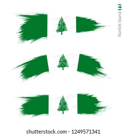 Set of 3 grunge textured flag of Norfolk Island, three versions of national country flag in brush strokes painted style. Vector flags.