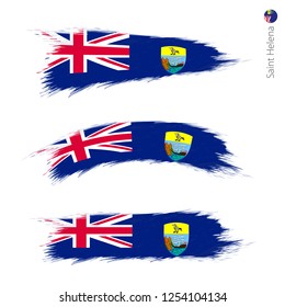 Set of 3 grunge textured flag of Saint Helena, three versions of national country flag in brush strokes painted style. Vector flags.