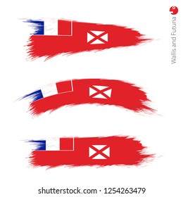 Set of 3 grunge textured flag of Wallis and Futuna, three versions of national country flag in brush strokes painted style. Vector flags.