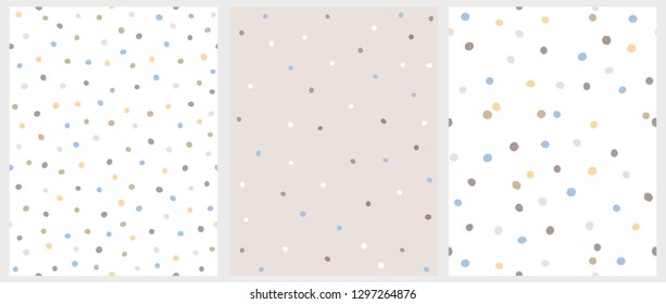 Set of 3 Hand Drawn Irregular Dots Vector Patterns. Blue, Brown and Beige Dots on a White Background. Blue, White and Brown Dots on a Beige Background. Infantile Style Abstract Art. Repeatable Design.