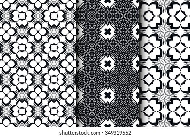 Set of 3 seamless geometric square patterns with repeating texture for fabric or paper print.  Black and white vector collection