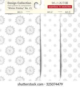 Set of 3 winter paisley vector seamless patterns: main pattern with daisy and flower and two companions. Performed as textile sampler on hanger. Seamless patterns inside EPS file in swatches panel