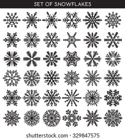 Set 36 black different snowflakes of handwork for design. New Year's symbols. Winter objects. Festive elements. Doodle sketch
