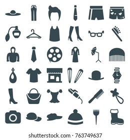 Set of 36 fashion filled icons such as boot, comb, man hairstyle, barber brush, perfume, beauty salon, hat, hanger, hair brush, woman bag, woman boot, hair barrette