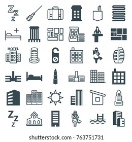 Set of 36 hotel filled and outline icons such as airport desk, building, towels, do not disturb, maid, bed, zzz, pool, lugagge, modern curved building, business center, mop