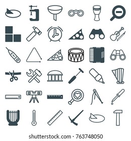 Set of 36 instrument filled and outline icons such as brick wall, vice clamp, harp, binoculars, medical hammer, harmonic, ruler, zoom out, hammer, scissors and ribbon, sundial