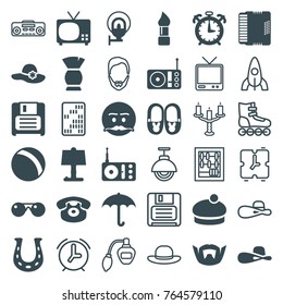 Set of 36 retro filled and outline icons such as ball, brush, woman hat, umbrella, emot with mustache, tv, table lamp, radio, desk phone, diskette, harmonic, street lamp