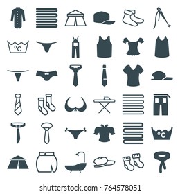 Set of 36 textile filled and outline icons such as towels, bra, shirt, laundry, female underwear, singlet, tie, pants, jacket, sewing, tent, baby socks, ironing table, socks