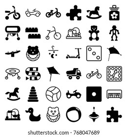 Set of 36 toy filled and outline icons such as teddy bear, pyramid, horse toy, bike, child bicycle, child building kit, swing, kite, dice, dice game, robot, board game