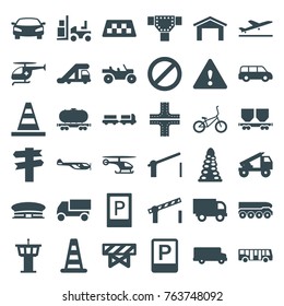 Set of 36 traffic filled icons such as taxi, plane taking off, airport bus, parking, truck with luggage, truck crane, cone barrier, helicopter, barrier, garage, airport tower